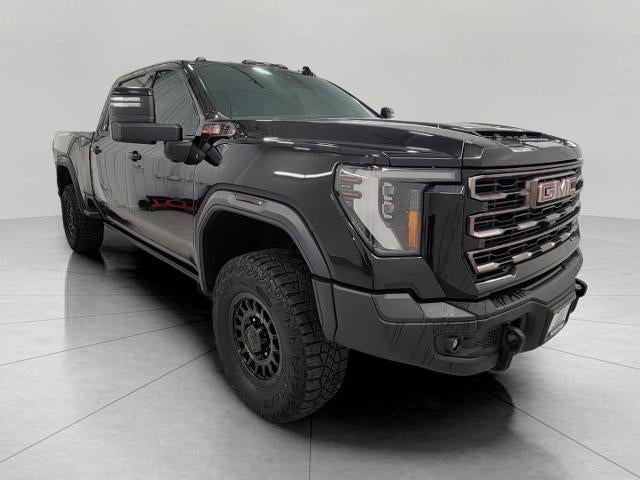 2024 GMC Sierra 2500 HD 4WD Crew Cab 159 AT4X in Onyx Black — front three-quarter view