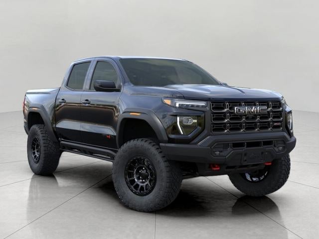 2026 GMC Canyon 4WD Crew Cab AT4X in Onyx Black — front three-quarter view