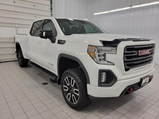 2020 GMC Sierra 1500 4WD Crew Cab 147 AT4 in Summit White — front three-quarter view